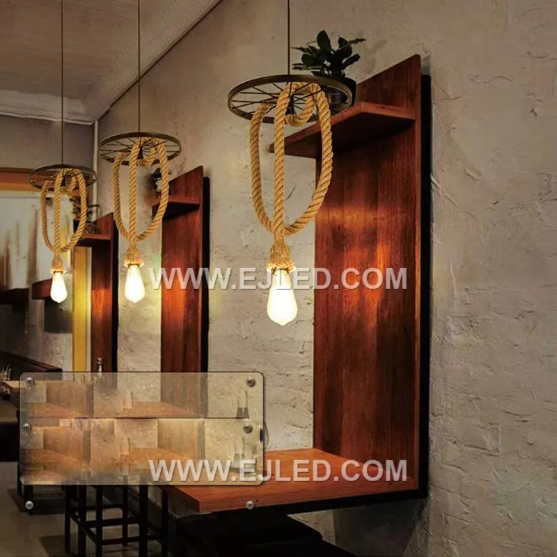 The RP0012 pendant light features a single exposed lamp surrounded by a large, flat "wheel" shade entirely constructed from artfully twisted hemp rope. This design offers unhindered, omnidirectional illumination. - view 2