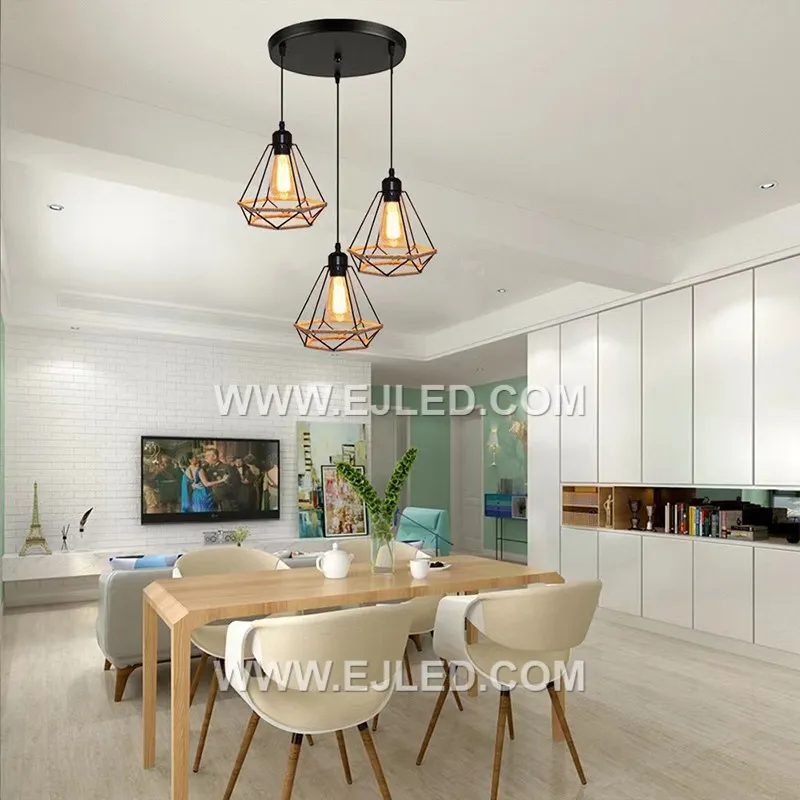 This cluster pendant, RP0015, features three individual black iron cages, each intricately wrapped in hemp rope, suspending at varied heights for a dynamic visual effect. - view 3