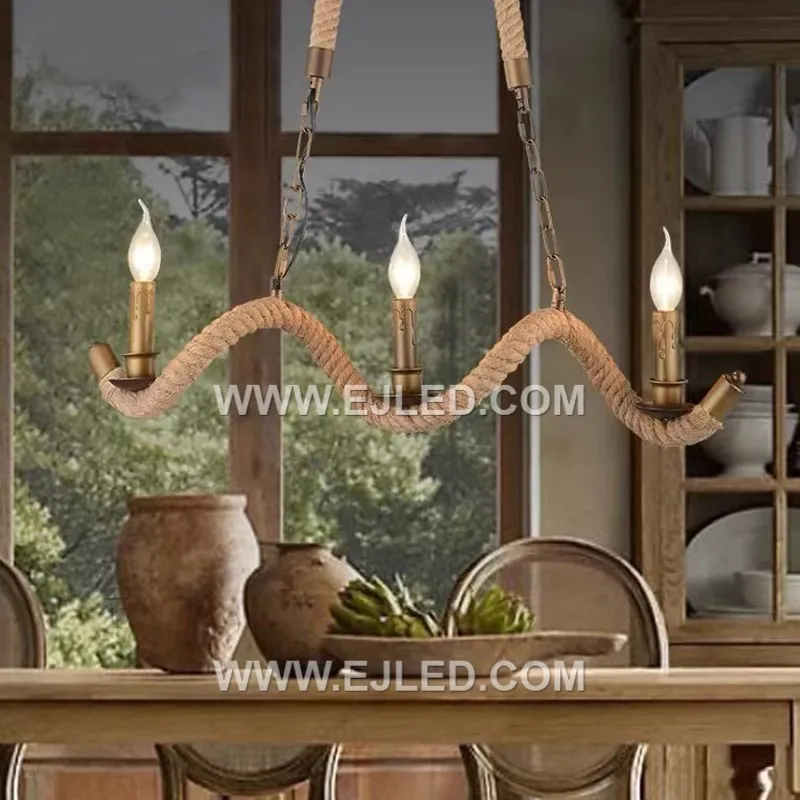 A distinctive wooden core wrapped entirely in hemp rope forms the candle-shaped body of the RP0025 pendant, housing a single exposed E27 lamp. - view 3