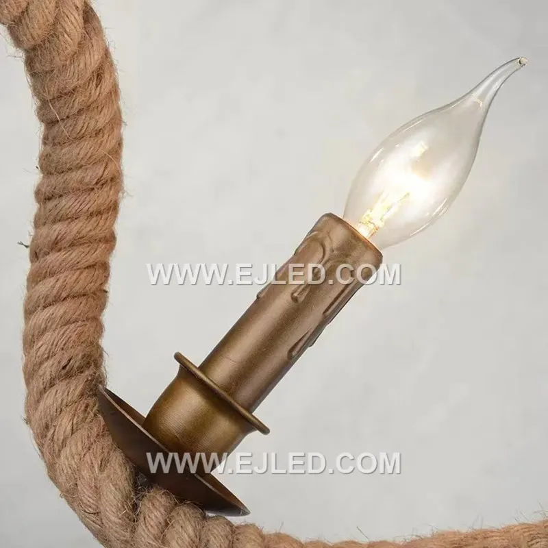 A distinctive wooden core wrapped entirely in hemp rope forms the candle-shaped body of the RP0025 pendant, housing a single exposed E27 lamp. - view 4