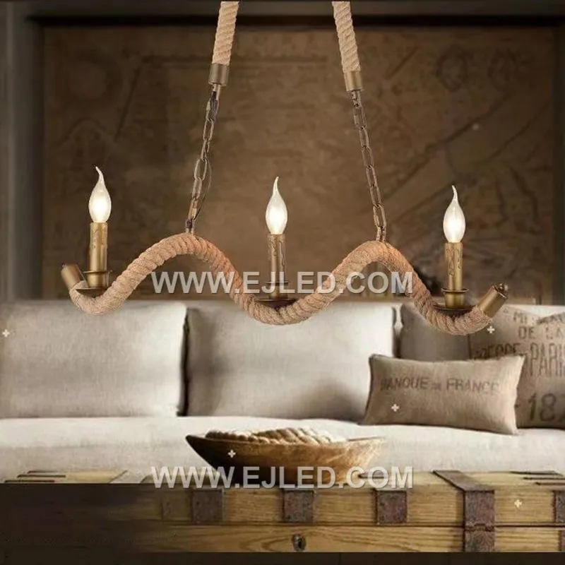A distinctive wooden core wrapped entirely in hemp rope forms the candle-shaped body of the RP0025 pendant, housing a single exposed E27 lamp. - view 5
