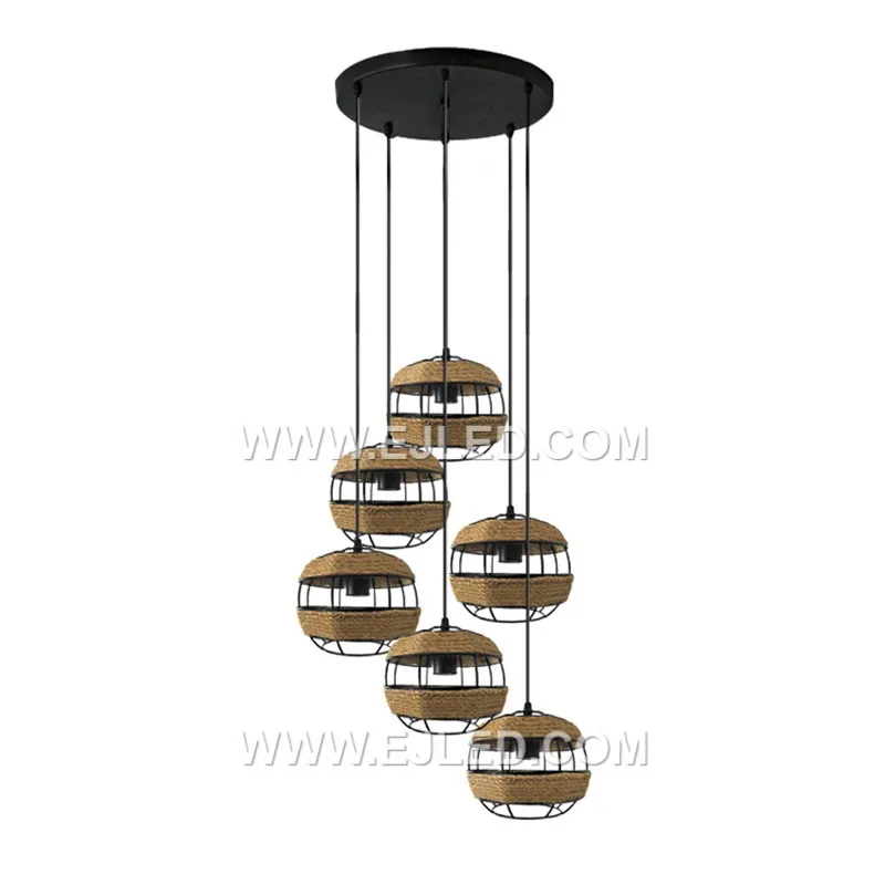 A perfect sphere, the RP0037 pendant is formed by natural hemp rope tightly wrapped around an iron frame. This single-lamp fixture offers fully diffused light and a substantial presence for various ceiling heights. - view 4