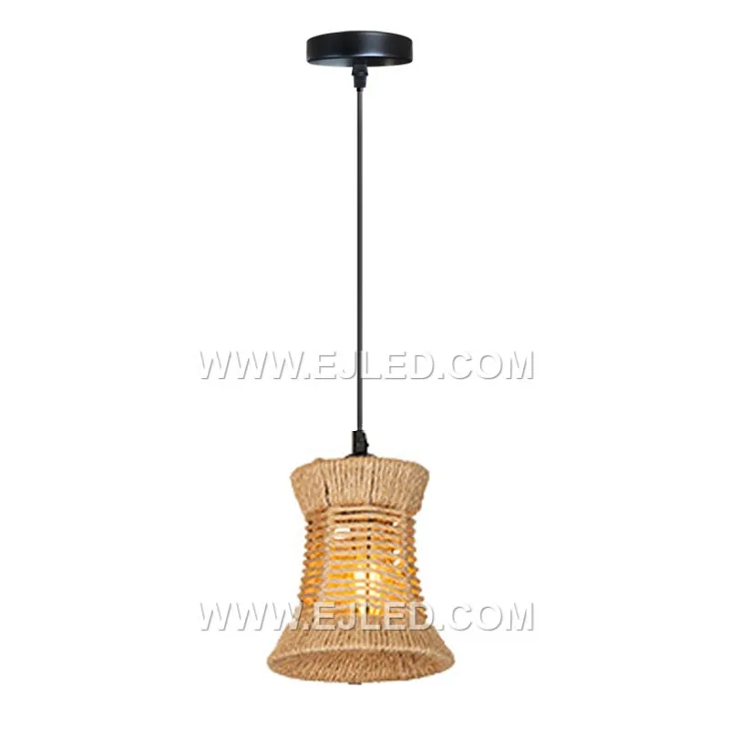 Bell-shaped, the RP0039 pendant is woven from natural rattan strips, creating a semi-open shade that allows light to filter through its texture. It holds a single lamp, directing light downwards.