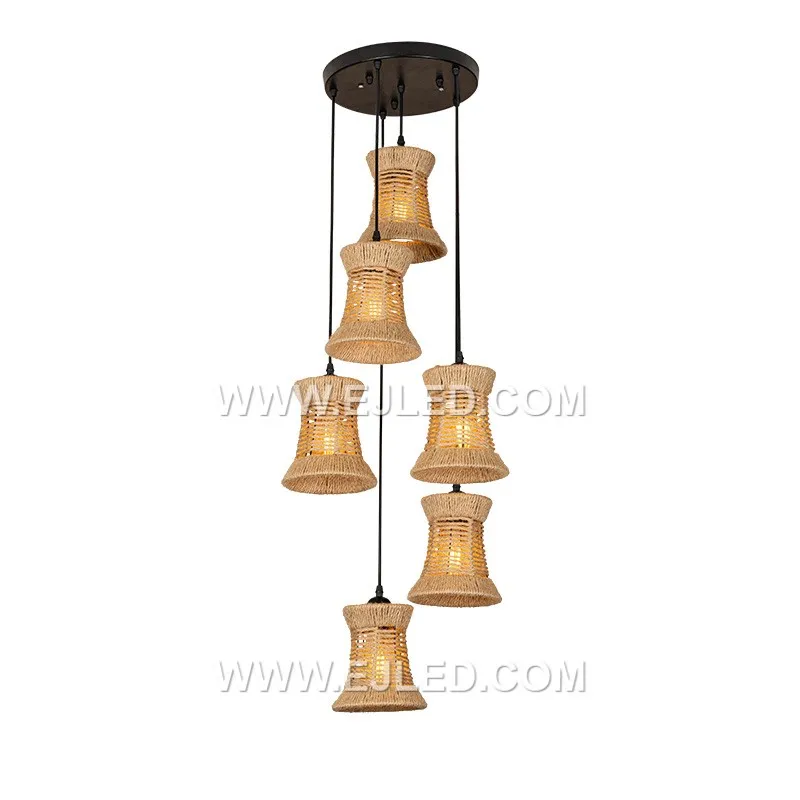 Bell-shaped, the RP0039 pendant is woven from natural rattan strips, creating a semi-open shade that allows light to filter through its texture. It holds a single lamp, directing light downwards. - view 5