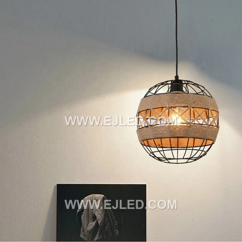 The RP0040 is a spherical pendant, crafted with a fabric or fine rope shade over an iron frame. Its single lamp and chain suspension make it suitable for various hospitality or residential settings. - view 5