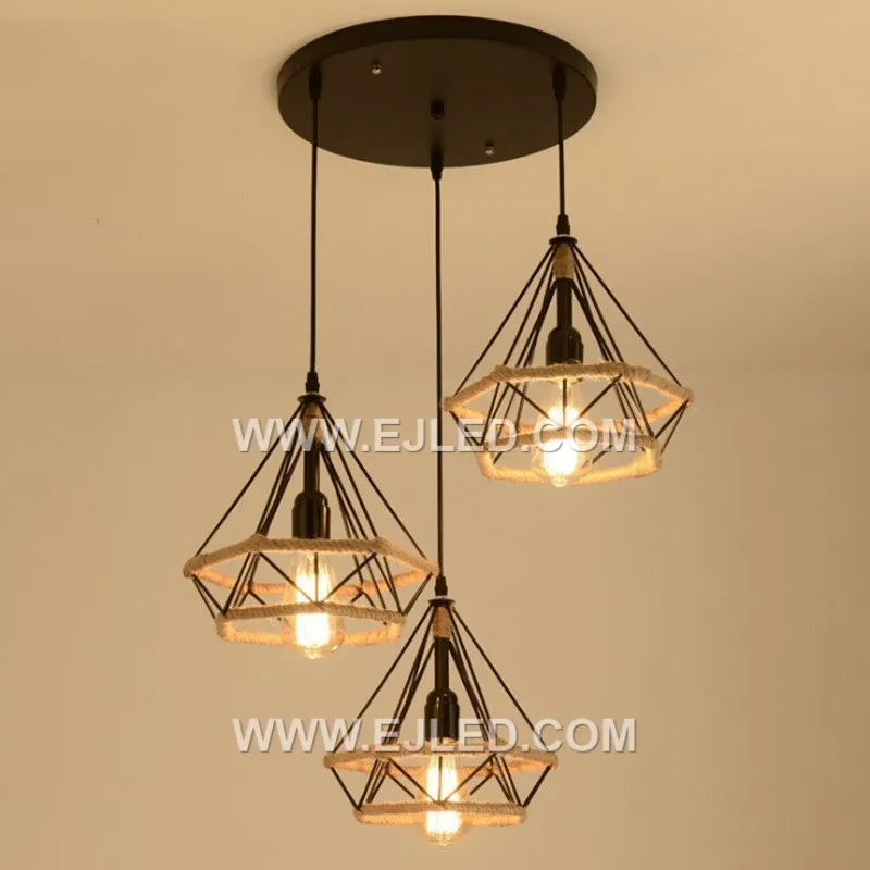 The RP0052 is a pyramid-shaped pendant with an open black iron frame wrapped in natural hemp rope. Its design ensures an unhindered spread of light from a single exposed bulb, ideal for accent lighting. - view 5