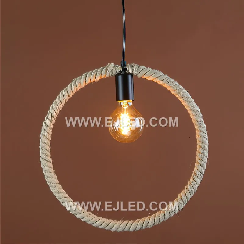This round hemp rope pendant, RP0056, features a drum-shaped shade tightly woven around a black metal frame. Its open base projects a focused downward light, making it suitable for dining areas or task lighting. - view 4