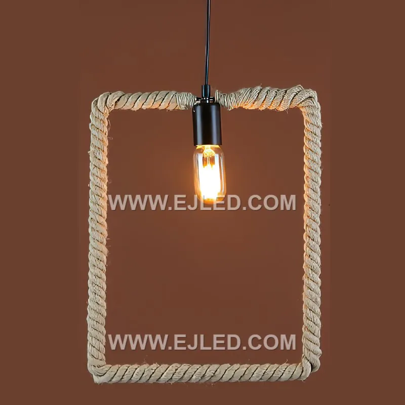 Natural hemp rope forms the cuboid shade of the RP0058 pendant, meticulously wrapped around a black metal frame. Its open structure allows for ambient light distribution, showcasing the bulb within a rustic yet defined form. - view 4