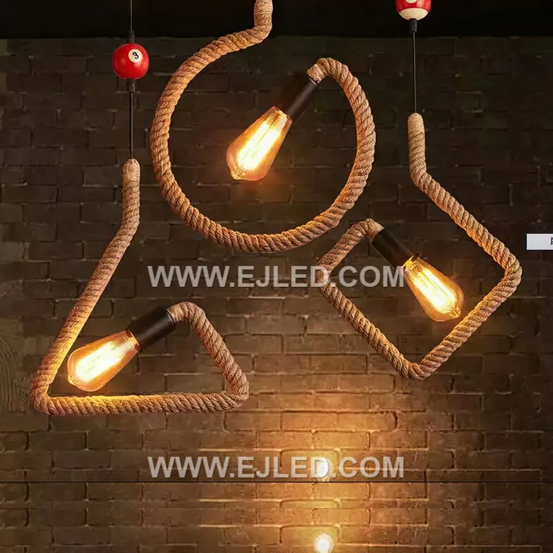The RP0059 pendant light introduces a distinctive cylindrical form to the hemp rope series, crafted from natural rope tightly wrapped around a black metal frame. Its open ends allow for broad light diffusion. - view 3