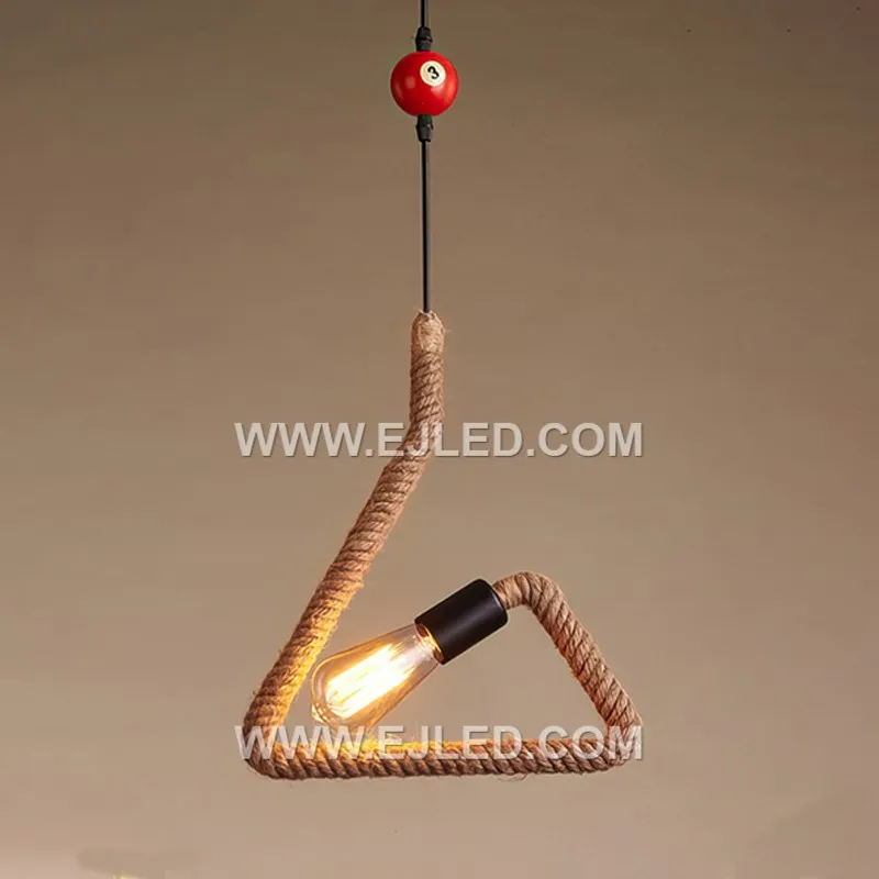 The RP0059 pendant light introduces a distinctive cylindrical form to the hemp rope series, crafted from natural rope tightly wrapped around a black metal frame. Its open ends allow for broad light diffusion. - view 4