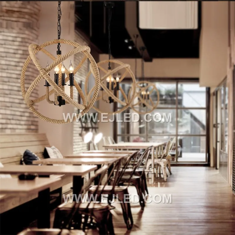 The RP0073 pendant features a distinctive flattened rattan basket-weave design, allowing an open view of the lamp. Its wide, open bottom casts ample downward light, making it suitable for dining or living areas. - view 5