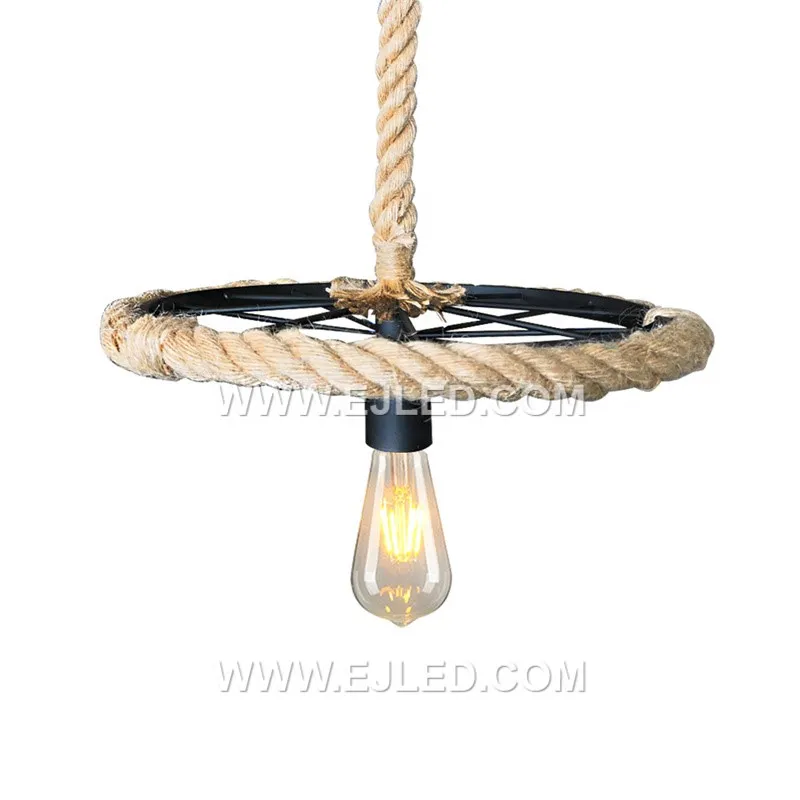 Suited for open spaces or rooms with higher ceilings, the RP0074 pendant features a large, round glass shade with a dark, antiqued finish. Its substantial presence and single visible lamp provide a focused yet ambient light source.