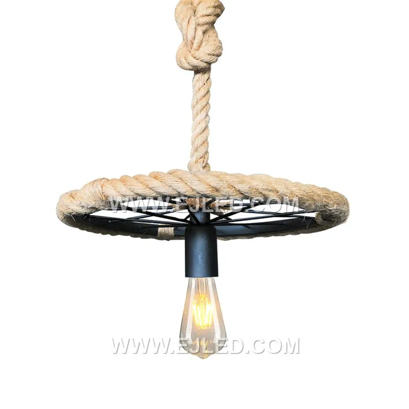 Suited for open spaces or rooms with higher ceilings, the RP0074 pendant features a large, round glass shade with a dark, antiqued finish. Its substantial presence and single visible lamp provide a focused yet ambient light source. - view 2