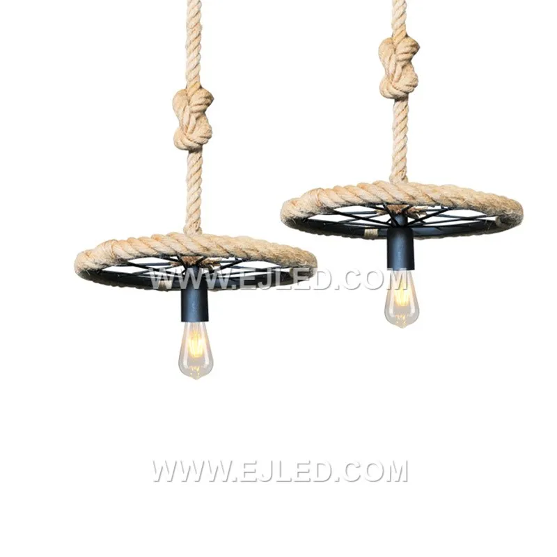Suited for open spaces or rooms with higher ceilings, the RP0074 pendant features a large, round glass shade with a dark, antiqued finish. Its substantial presence and single visible lamp provide a focused yet ambient light source. - view 5