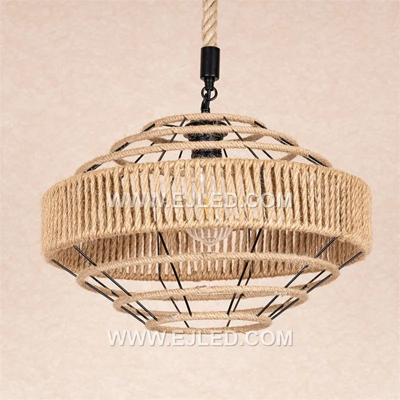 Tightly woven natural rattan forms the wide, drum-shaped shade of the RP0077 pendant light. Its open bottom provides direct illumination, making it suitable for task lighting over counters or dining tables. - view 2