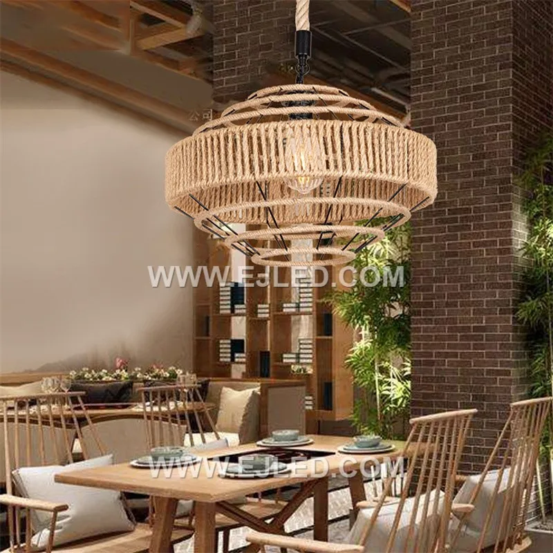 Tightly woven natural rattan forms the wide, drum-shaped shade of the RP0077 pendant light. Its open bottom provides direct illumination, making it suitable for task lighting over counters or dining tables. - view 6
