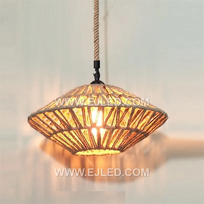 This wide, open-weave rattan pendant, RP0078, creates a soft, ambient glow, allowing the bulb to be seen. Its bell-like form is suitable for various casual or natural-themed interiors. - view 2