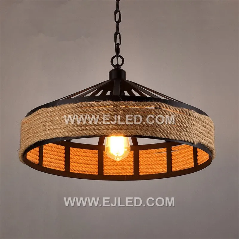 A drum-shaped pendant, the RP0080 features a dark, open-slat weave, allowing light to emanate from all sides while providing direct downward illumination. It suits modern rustic or hospitality settings.