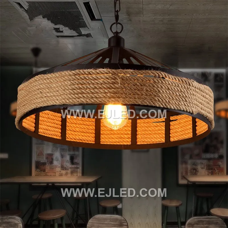 A drum-shaped pendant, the RP0080 features a dark, open-slat weave, allowing light to emanate from all sides while providing direct downward illumination. It suits modern rustic or hospitality settings. - view 2