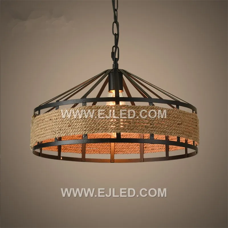 A drum-shaped pendant, the RP0080 features a dark, open-slat weave, allowing light to emanate from all sides while providing direct downward illumination. It suits modern rustic or hospitality settings. - view 3