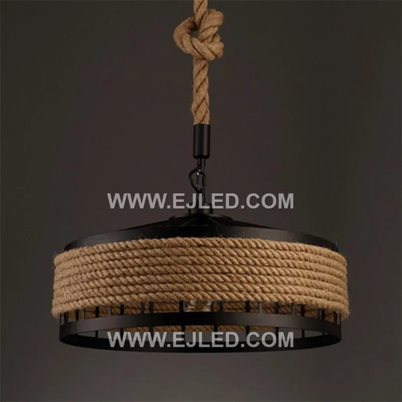 A drum-shaped pendant, the RP0080 features a dark, open-slat weave, allowing light to emanate from all sides while providing direct downward illumination. It suits modern rustic or hospitality settings. - view 4