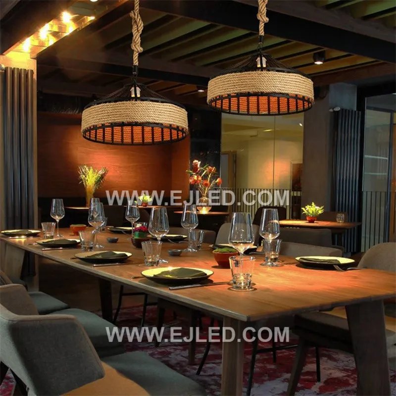 A drum-shaped pendant, the RP0080 features a dark, open-slat weave, allowing light to emanate from all sides while providing direct downward illumination. It suits modern rustic or hospitality settings. - view 5
