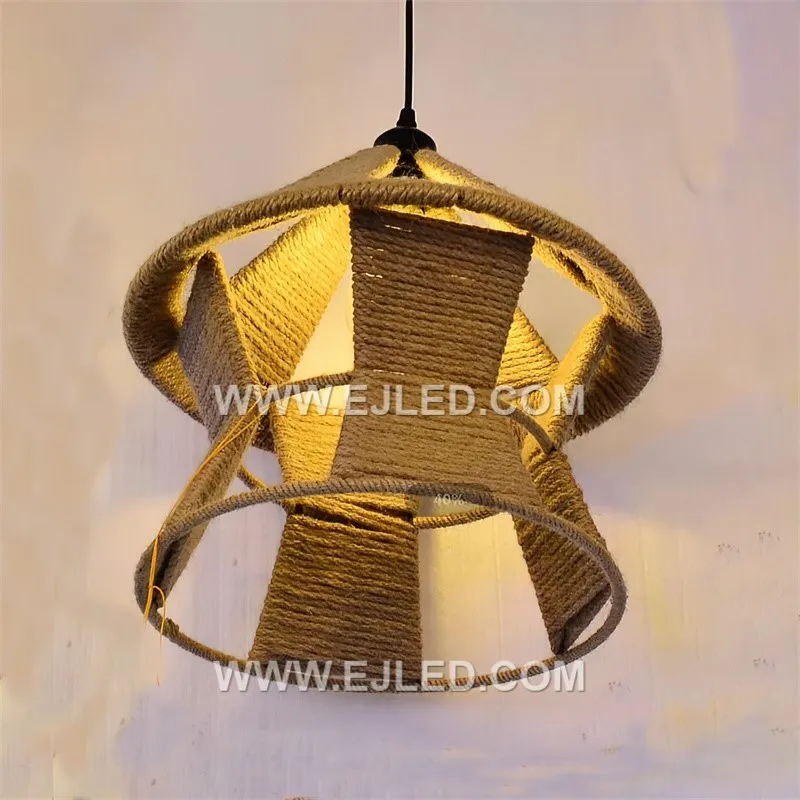 Natural rattan forms the Pagoda-shaped shade of the RP0082 pendant light. Its distinctive silhouette and open weave create a soft, diffused ambient light, ideal for boutique hotels or residential spaces seeking organic texture. - view 3