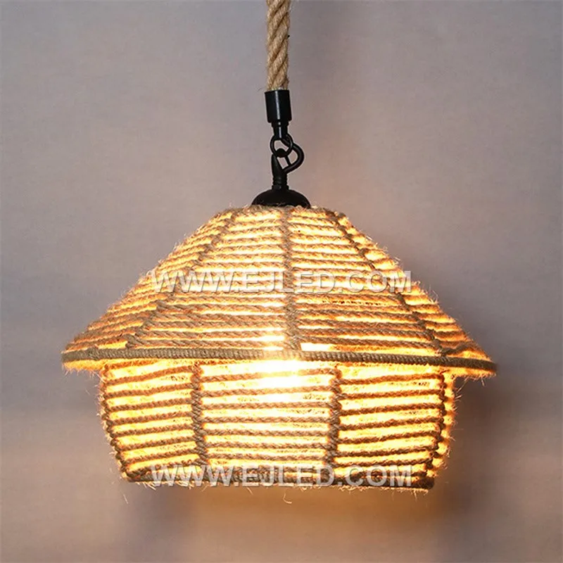 This tiered pagoda pendant is woven from natural rattan, creating a warm, open-bottomed shade with a visible lamp. Its organic material and silhouette make it suitable for various casual or hospitality settings. - view 2