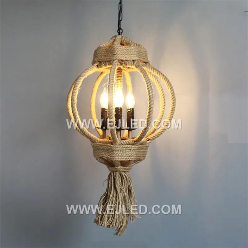 The RP0084 is a broad, dome-shaped pendant woven from natural rattan, featuring four internal lamps. Its open design provides widespread, diffused ambient light, suitable for illuminating larger communal areas. - view 2