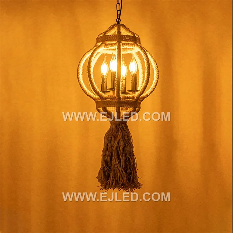 The RP0084 is a broad, dome-shaped pendant woven from natural rattan, featuring four internal lamps. Its open design provides widespread, diffused ambient light, suitable for illuminating larger communal areas. - view 4