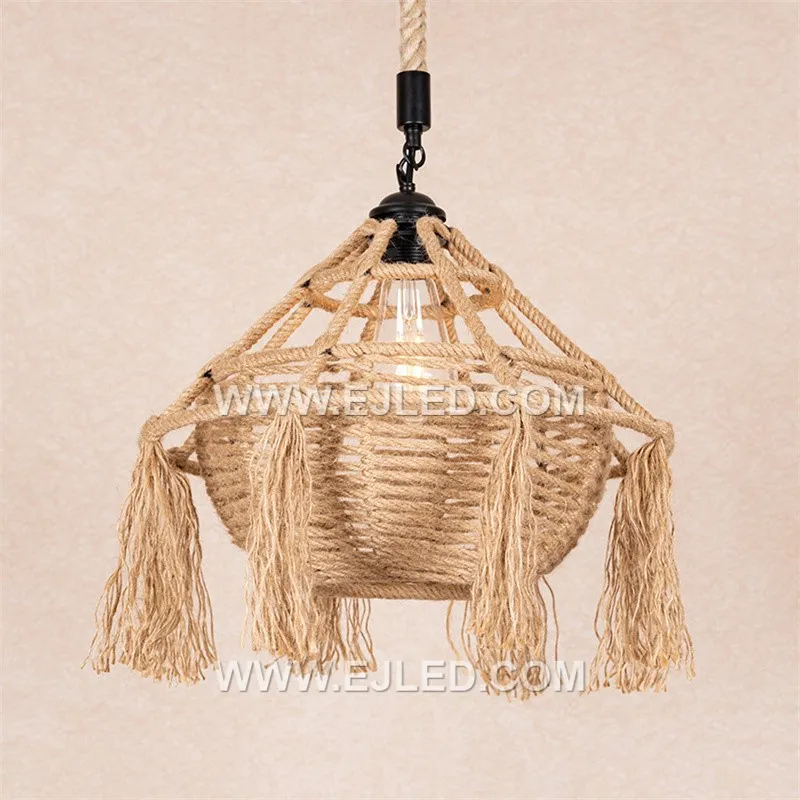 The RP0085 is a distinctive bowl-shaped pendant light, intricately woven from natural rattan with a decorative tassel fringe. Its recessed single lamp provides a soft, focused downlight, enhancing intimate dining or lounge areas. - view 2