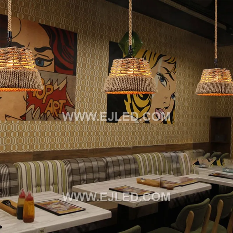The RP0097 bell pendant, woven from natural rattan with a moderately open structure, offers diffused downward light that minimizes direct glare. Its classic shape and textured material create a warm ambiance while illuminating surfaces below.