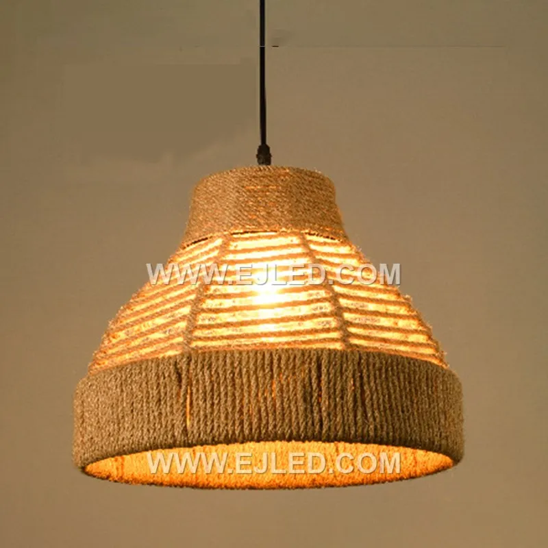 The RP0099 pendant offers a broad, shallow profile, making it suitable for rooms with lower ceilings or over wide surfaces like dining tables and kitchen islands. Its open, hand-woven shade projects diffuse ambient light downwards. - view 3