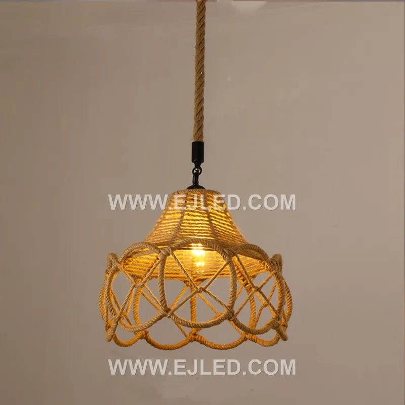 The RP0103 pendant offers a distinct departure from typical open-weave designs with its deep, fabric conical shade. This fixture directs a focused downward light, providing concentrated illumination for task areas or ambient glow. - view 2