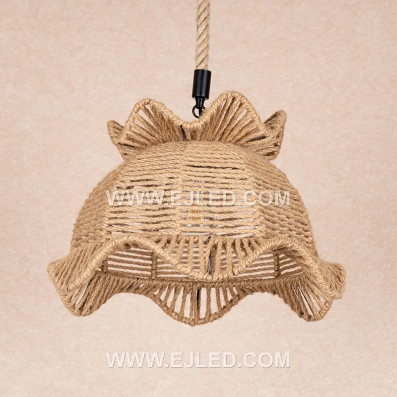 This bell-shaped rattan pendant, the RP0104, features an open, hand-woven texture that permits light to diffuse in all directions. It offers a warm, inviting glow, making it suitable for ambient illumination in various spaces. - view 2