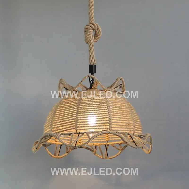 This bell-shaped rattan pendant, the RP0104, features an open, hand-woven texture that permits light to diffuse in all directions. It offers a warm, inviting glow, making it suitable for ambient illumination in various spaces. - view 3
