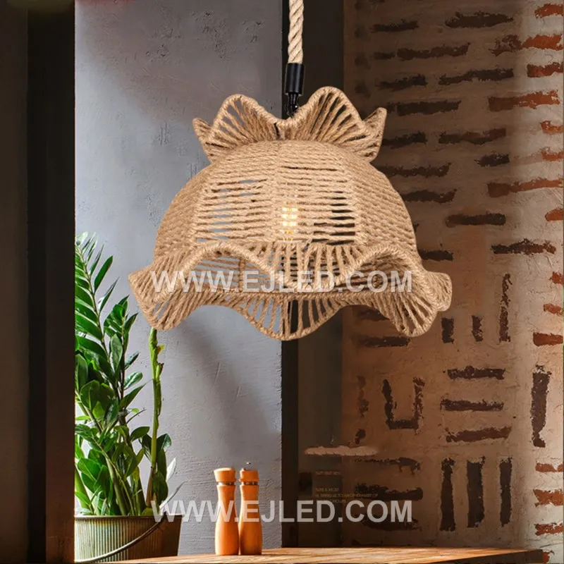 This bell-shaped rattan pendant, the RP0104, features an open, hand-woven texture that permits light to diffuse in all directions. It offers a warm, inviting glow, making it suitable for ambient illumination in various spaces. - view 6