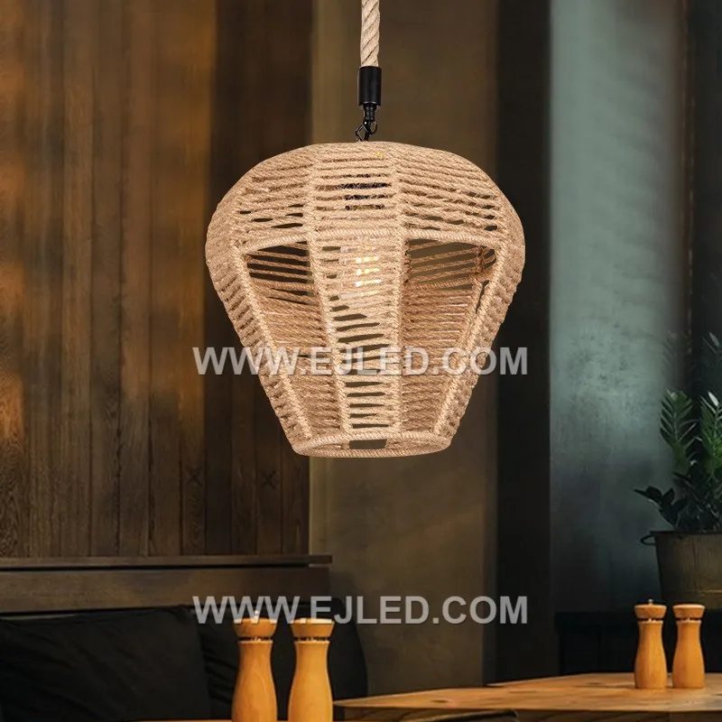 A bell-shaped pendant light, the RP0115 is woven from rattan, forming a shade that directs light downwards. Its design minimizes glare while providing a focused illumination, suitable for tasks or creating defined zones. - view 7