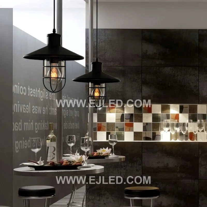 This industrial-style pendant features an iron bowl shade, with an internal wire cage protecting the lamp. Its robust design provides focused downward light, suitable for various commercial or hospitality settings. - view 2