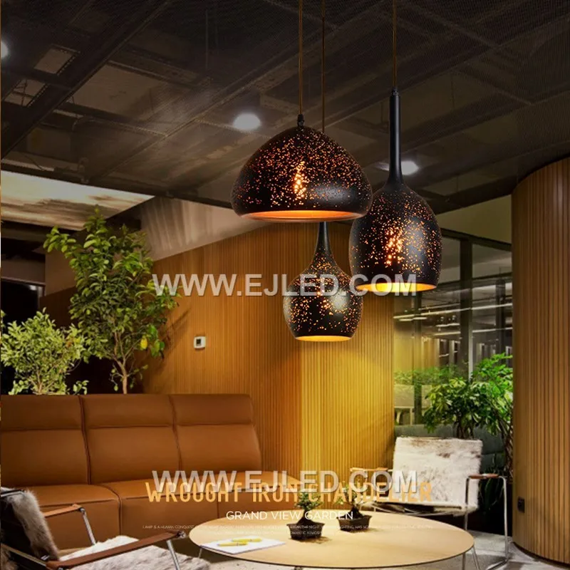 Crafted from durable iron, the MK0046 is a dome pendant with a dark finish. Its distinctive perforated shade creates a "starry sky" effect, casting a decorative pattern of light. - view 5