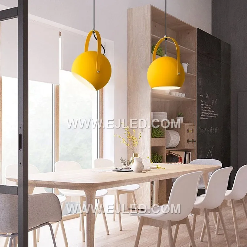 The MK0094 is a black steel barn pendant featuring a wide, round shade and a distinctive decorative band around its upper perimeter. It directs a focused downlight, suitable for rustic or industrial settings. - view 4