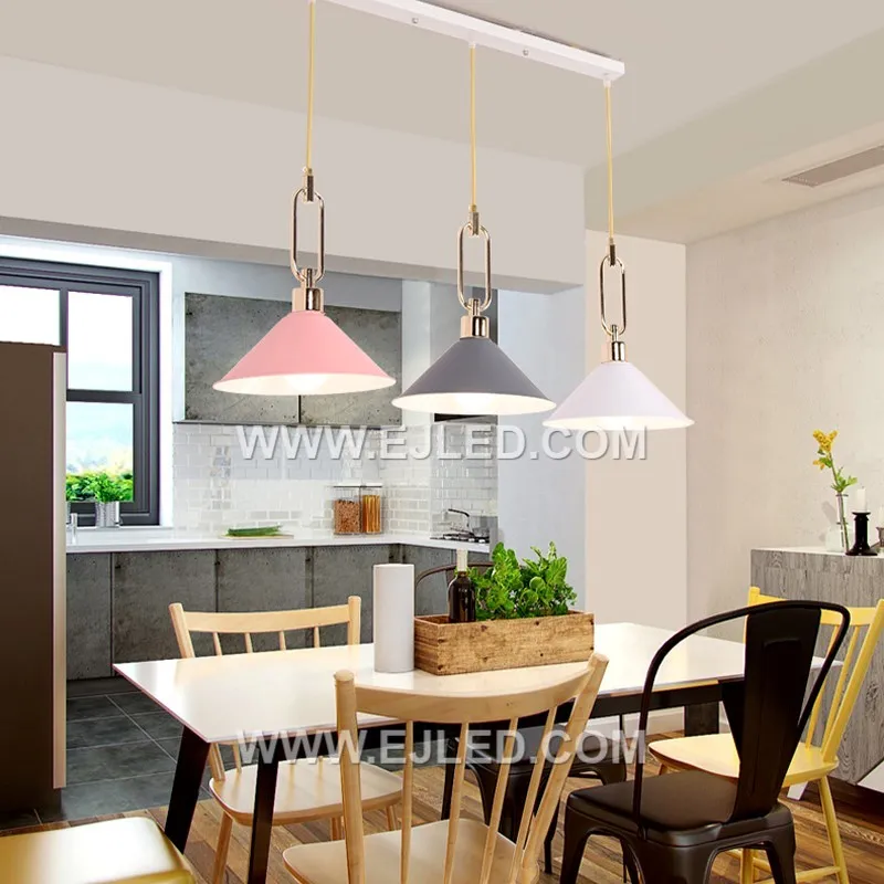 The MK0113 is a deep, conical pendant light constructed from aluminum with a matte black exterior and reflective interior. Its focused downlight makes it suitable for individual task areas or as a clustered arrangement in larger spaces. - view 2