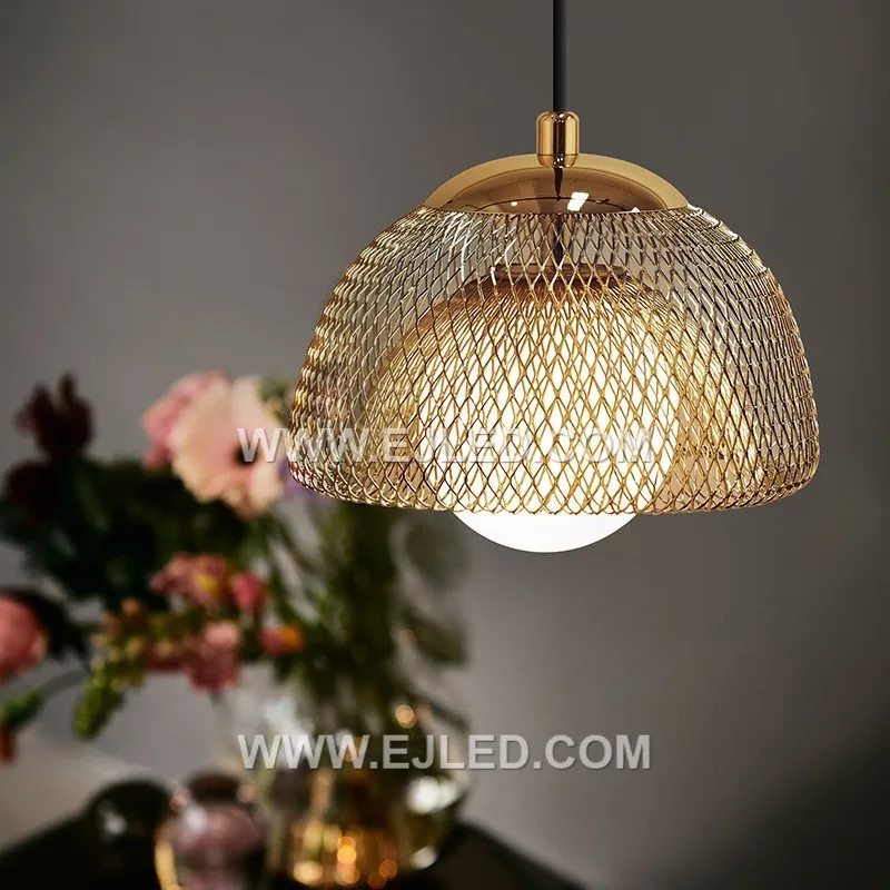 A distinctive dome silhouette defines the MK0117 pendant, formed by an open cage of slender brass rods, finished in a subtle golden hue. Its airy design allows for widespread ambient light, making it a distinctive focal point in modern or rustic interiors. - view 2