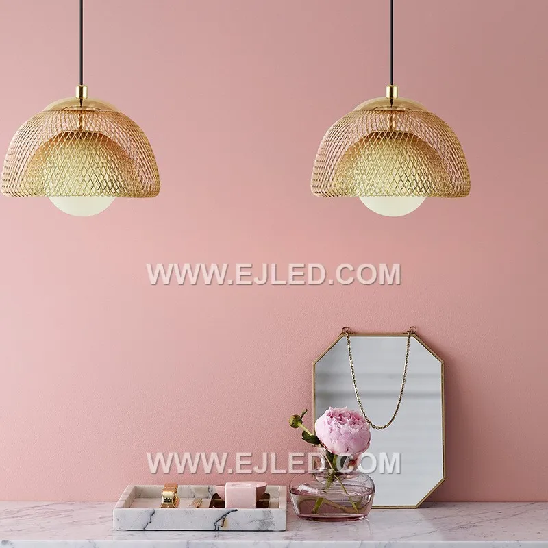 A distinctive dome silhouette defines the MK0117 pendant, formed by an open cage of slender brass rods, finished in a subtle golden hue. Its airy design allows for widespread ambient light, making it a distinctive focal point in modern or rustic interiors. - view 3