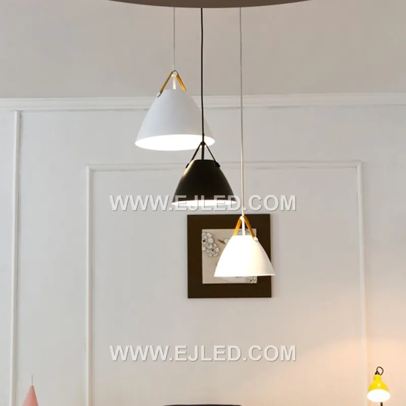 This MK0120 spider-style pendant features three arms, each terminating in a small, inverted dome shade. Constructed from iron with a black finish, it provides directional illumination from three separate lamps, making it suitable for larger spaces. - view 2