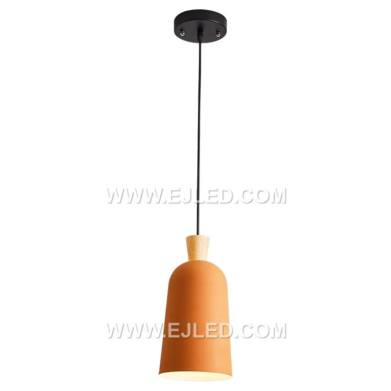 The MK0122 is a small, bell-shaped pendant light crafted from natural wood, featuring a light finish and visible grain. It provides focused downlighting from a single lamp, ideal for intimate settings or task illumination.