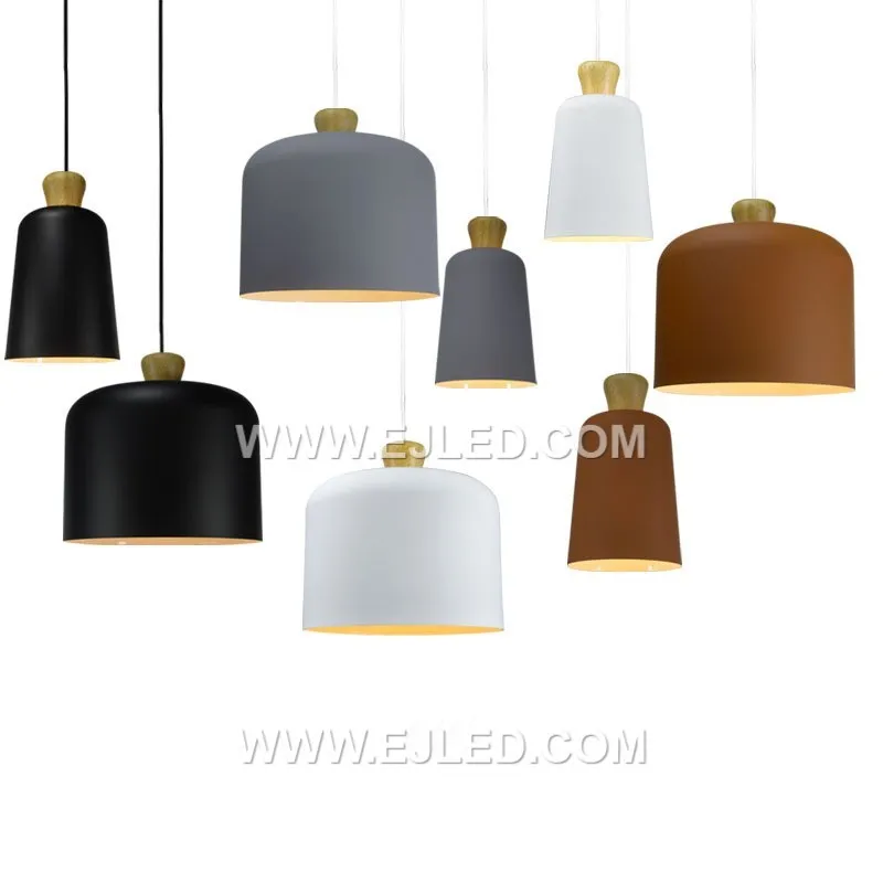 The MK0122 is a small, bell-shaped pendant light crafted from natural wood, featuring a light finish and visible grain. It provides focused downlighting from a single lamp, ideal for intimate settings or task illumination. - view 2