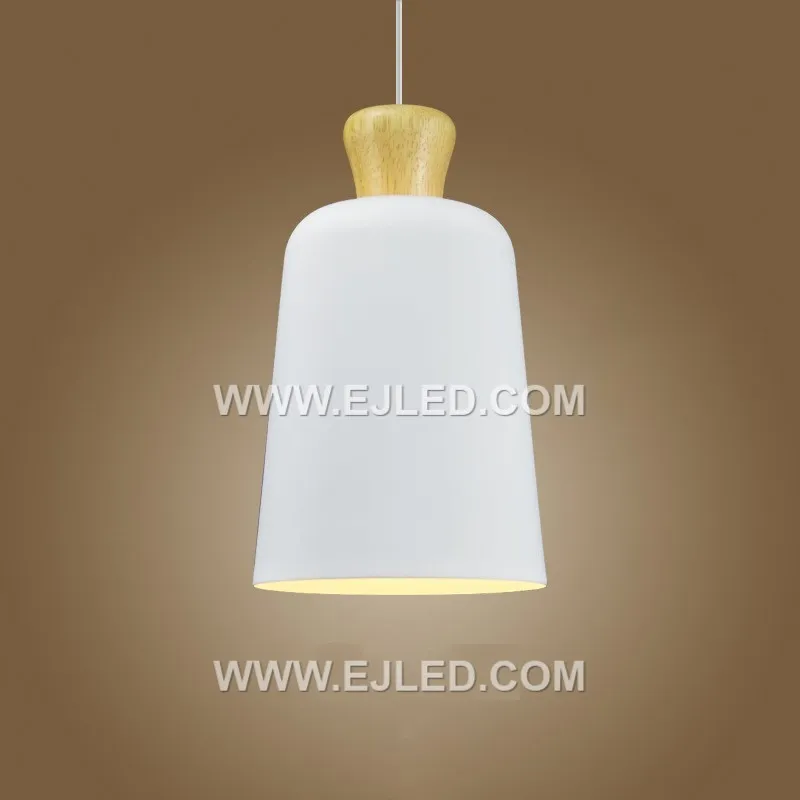 The MK0122 is a small, bell-shaped pendant light crafted from natural wood, featuring a light finish and visible grain. It provides focused downlighting from a single lamp, ideal for intimate settings or task illumination. - view 3