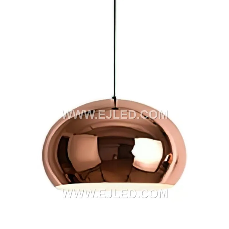 This dome pendant light, with its shallow profile and gradient finish, is well-suited for task lighting above kitchen islands or dining tables. Its black exterior transitions to a warm copper interior, providing a soft, directed glow.