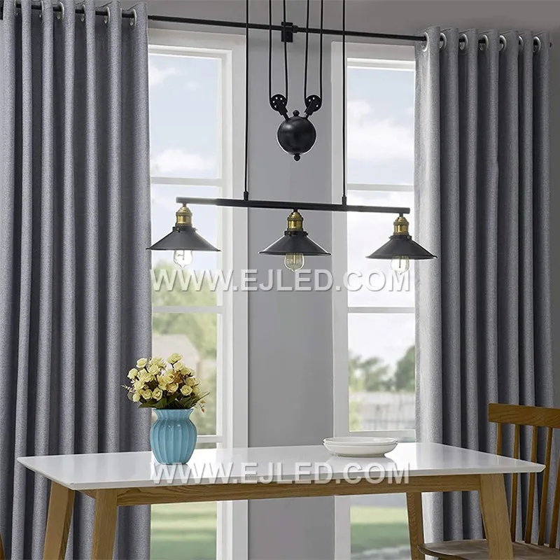 This linear chandelier, featuring three bowl-shaped iron shades, is proportioned for longer dining tables or large kitchen islands. Its extended form provides balanced illumination across expansive surfaces in a room. - view 3